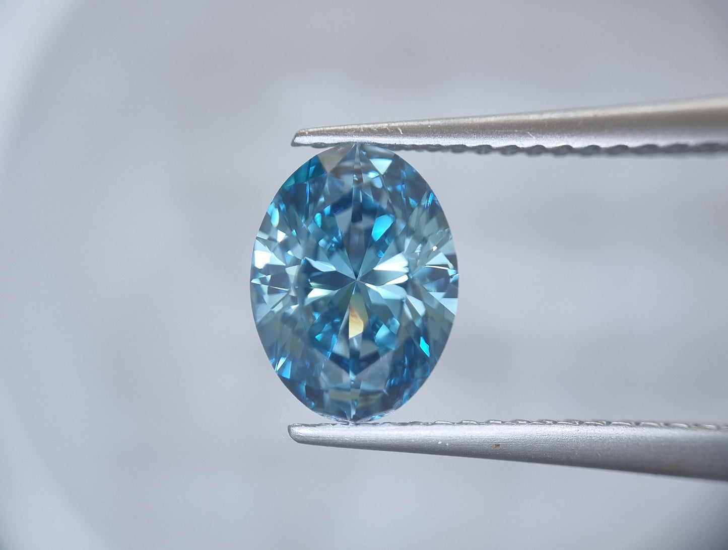 Fancy Intense Greenish Blue Oval Cut Lab Grown Diamond 1.79 Carat