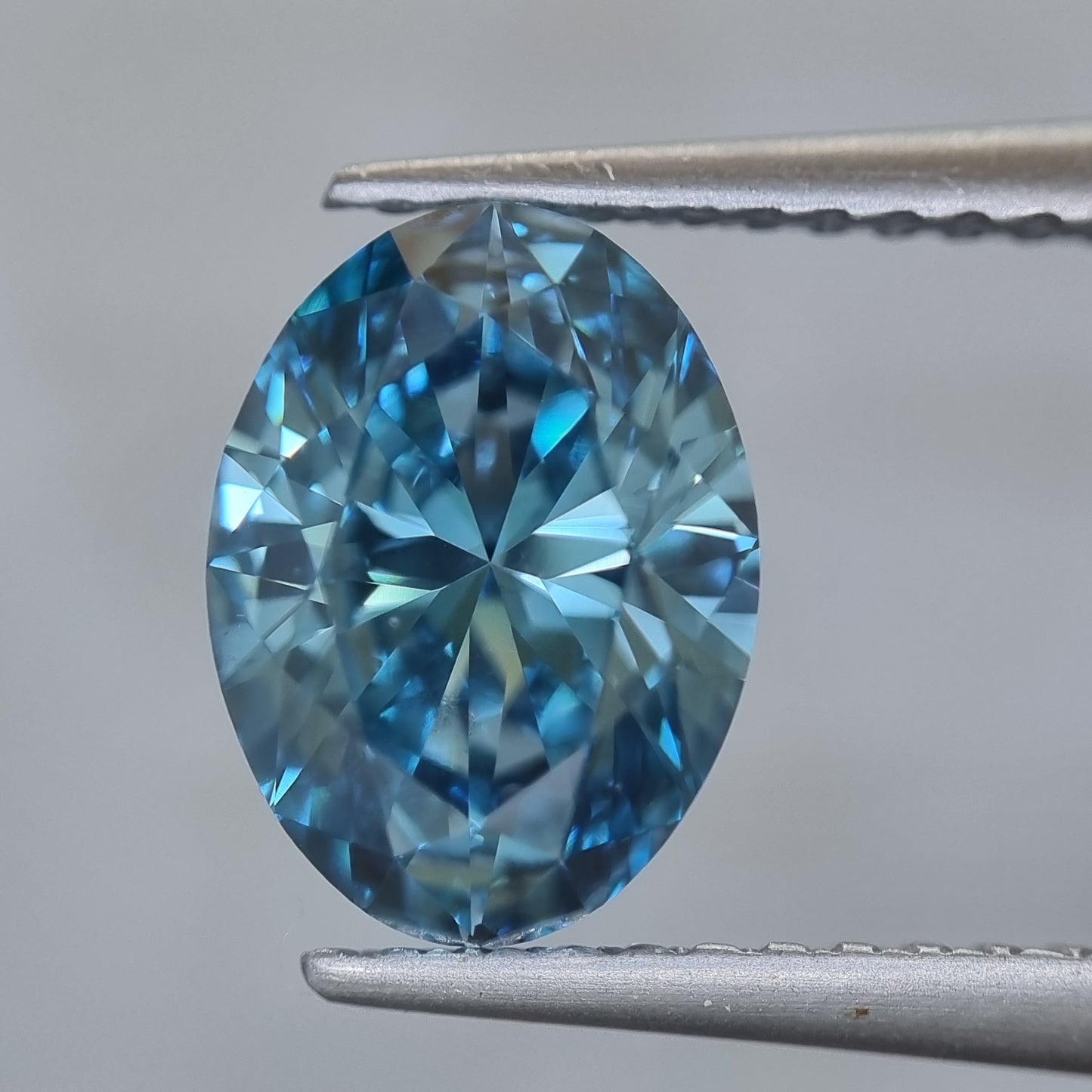 Fancy Intense Greenish Blue Oval Cut Lab Grown Diamond 1.79 Carat