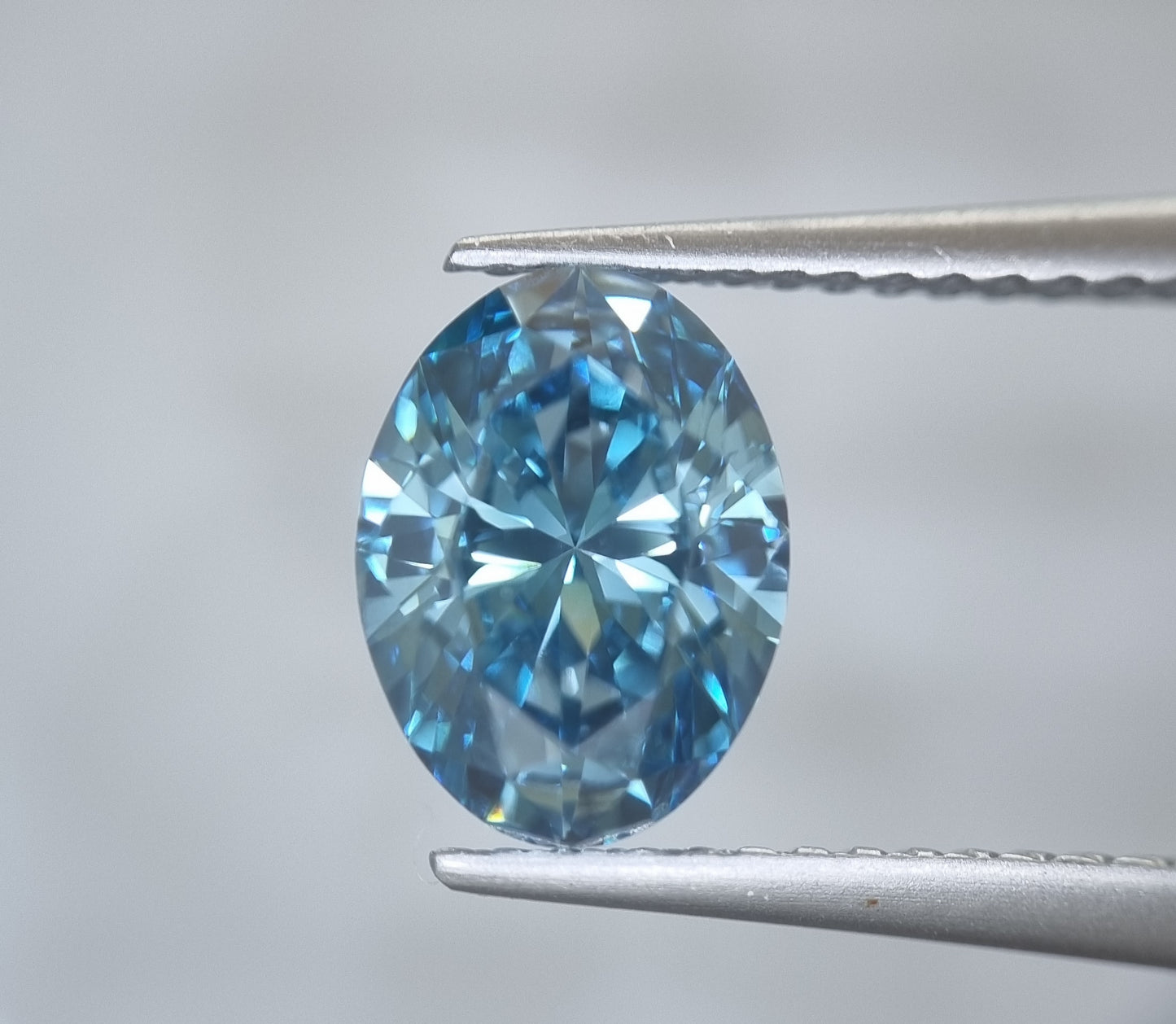 Fancy Intense Greenish Blue Oval Cut Lab Grown Diamond 1.79 Carat